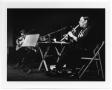 Photograph: [Flautist Performing Onstage]