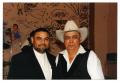 Photograph: [Johnny Degollado Standing Next to Another Man]