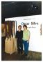 Thumbnail image of item number 1 in: '[Oscar Silva and Unnamed Woman in Front of Title Wall]'.