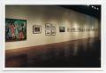 Photograph: [Row of Paintings on a Gallery Wall]