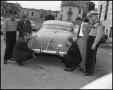 Photograph: [Applying Scotchlite Striping to police cars]