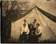 Photograph: Railroad Survey Crew Members Pose in Front of Tent, c. 1902