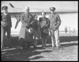 Photograph: Lt Chapman & family with "Flying Fortress Plane".