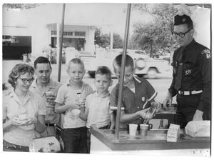 Primary view of object titled '[Boy Scouts with Scout Master, Delbert Wasson]'.