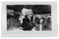 Photograph: Marie Burkhalter and a group of people ride in a river boat