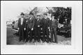 Photograph: [Five Men In Front of Car]