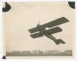 Photograph: [Plane lifting off from Barron Field]