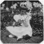 Photograph: [Katherine Elizabeth Griggs with Easter Lilies]