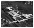 Photograph: [Aerial view of Del Dixie canning plant]