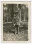 Photograph: [Uniformed Soldier Among Trees]