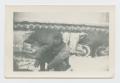 Photograph: [Fuzzy Raulston In Front of Tank]