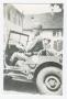 Photograph: [Soldiers in Jeep]