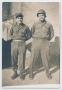 Photograph: [Two Soldiers By Wall]