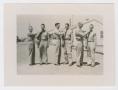 Photograph: [Promoted Officers Receiving Insignia]
