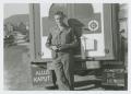 Photograph: [Soldier With an Ambulance]