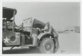 Photograph: [Henry Taylor Next to Truck]