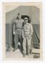 Photograph: [First Sergeant John Fitch and Irving Denemark Standing at a Tent Ent…