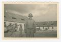 Photograph: [Corporal James Hannon in a Courtyard]