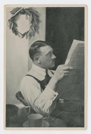 Primary view of object titled '[Hitler Reading a Newspaper]'.