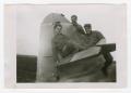 Photograph: [Three Soldiers Posing on an Aircraft's Tailplane]