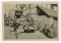 Thumbnail image of item number 1 in: '[Soldiers Gathered Around a Maintenance Truck]'.