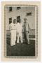 Photograph: [Susselman, Dan Melli, and Richard Johns by a Building]