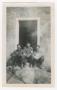 Photograph: [Three Soldiers Sitting in Furst Chateau's Doorway]