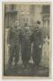 Photograph: [Three Soldiers Inside a Picket Fence]