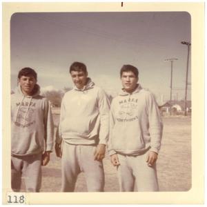 Primary view of object titled '[Three students in sweatshirts]'.