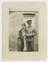 Photograph: [Clifford Koah and Another Soldier Posing by a Door]