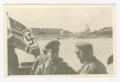 Photograph: [German Soldiers with a Nazi Flag]
