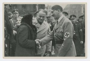 Primary view of object titled '[Adolf Hitler Speaking to a Couple]'.