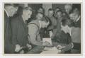 Photograph: [Hitler Signing a Book]