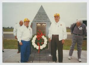 Primary view of object titled '[Mike Romano and Joe Mizer Standing by 12th Armored Division Memorial]'.