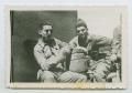 Photograph: [Soldiers Sitting with Barrel]
