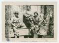 Photograph: [Three Soldiers by Vehicle]