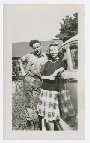 Primary view of object titled '[Couple by Car]'.