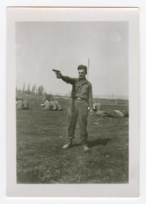 Primary view of object titled '[Joseph Tower with a Pistol and Sacks of Clothing]'.