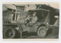 Primary view of [Soldiers Sitting in a Jeep]