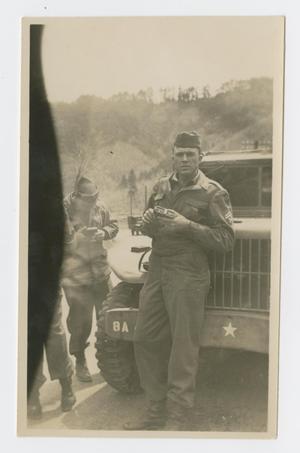 Primary view of object titled '[Soldier Leaning on Truck]'.