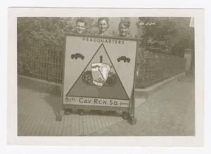 Primary view of object titled '[Three Soldiers Behind a Sign at Camp Campbell]'.