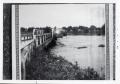 Photograph: [Flooded river with bridge]