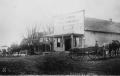 Photograph: [Buggy in front of general store]