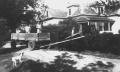 Primary view of [Rydell family in horse-drawn trailer]