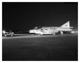 Photograph: Convair F-102 Being Taxied At Night