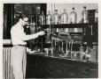 Photograph: [Photograph of Student in Chemistry Lab]