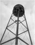 Photograph: R.D. Reese replacing bulb on water tower