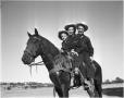 Photograph: Charlie, Helen and Dovie Gray on a horse