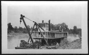 Primary view of object titled '[Boat near the bank of a river. Location unknown.]'.