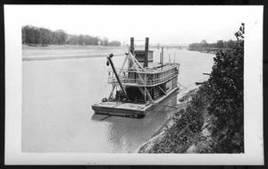 Primary view of object titled '[A Boat Close to River Bank. Location Unknown.]'.